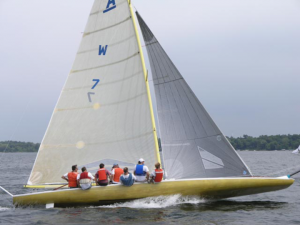 J.O. Johnson's grandson Steve Johnson at the helm of "Gryphon", the last A Scow built at JBW in 1963 (owned by Fletcher Driscoll).