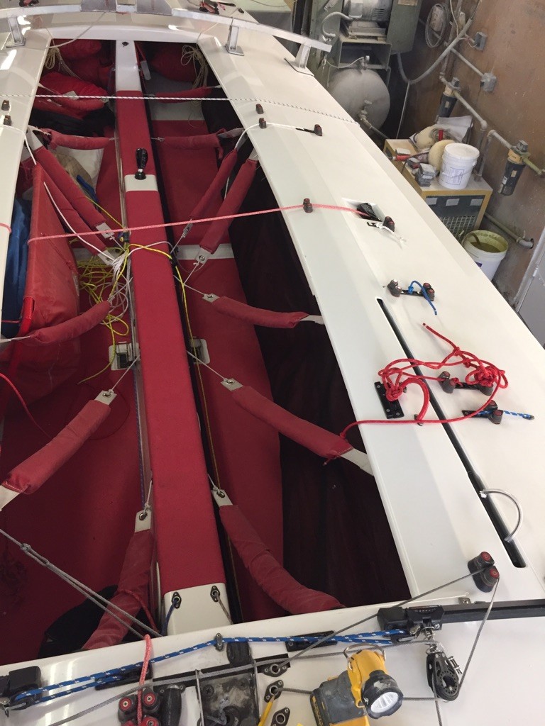 Cockpit with spinnaker "sock" on the port side.