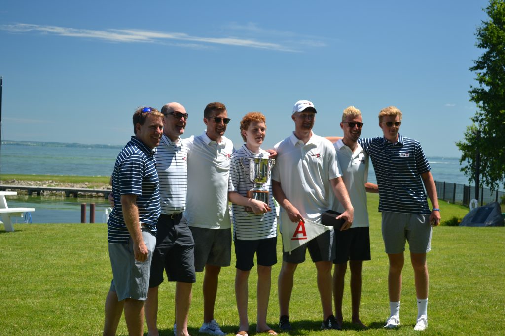 A Scow National Championships Runners-up (Left to Right): Tim Krech, T Freytag, Nathan Freytag, Aran Freytag, Dylan Freytag, Mac Six, Bo Freytag